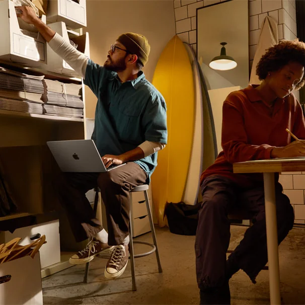 A MacBook Air in a creative workspace